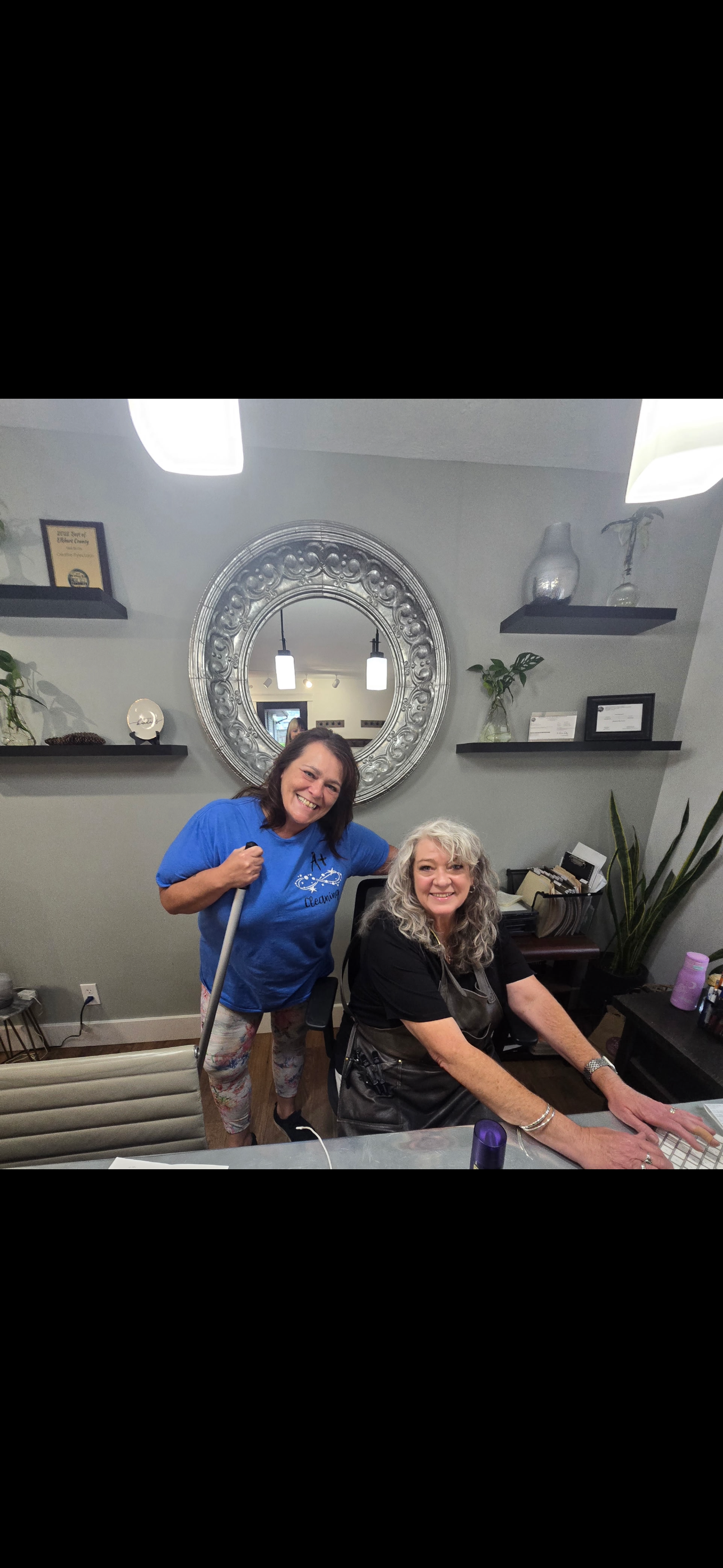 A+ team member with a client at Creative Styles Salon